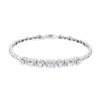 White Gold Bracelet Featuring Round and Emerald Cut Diamonds