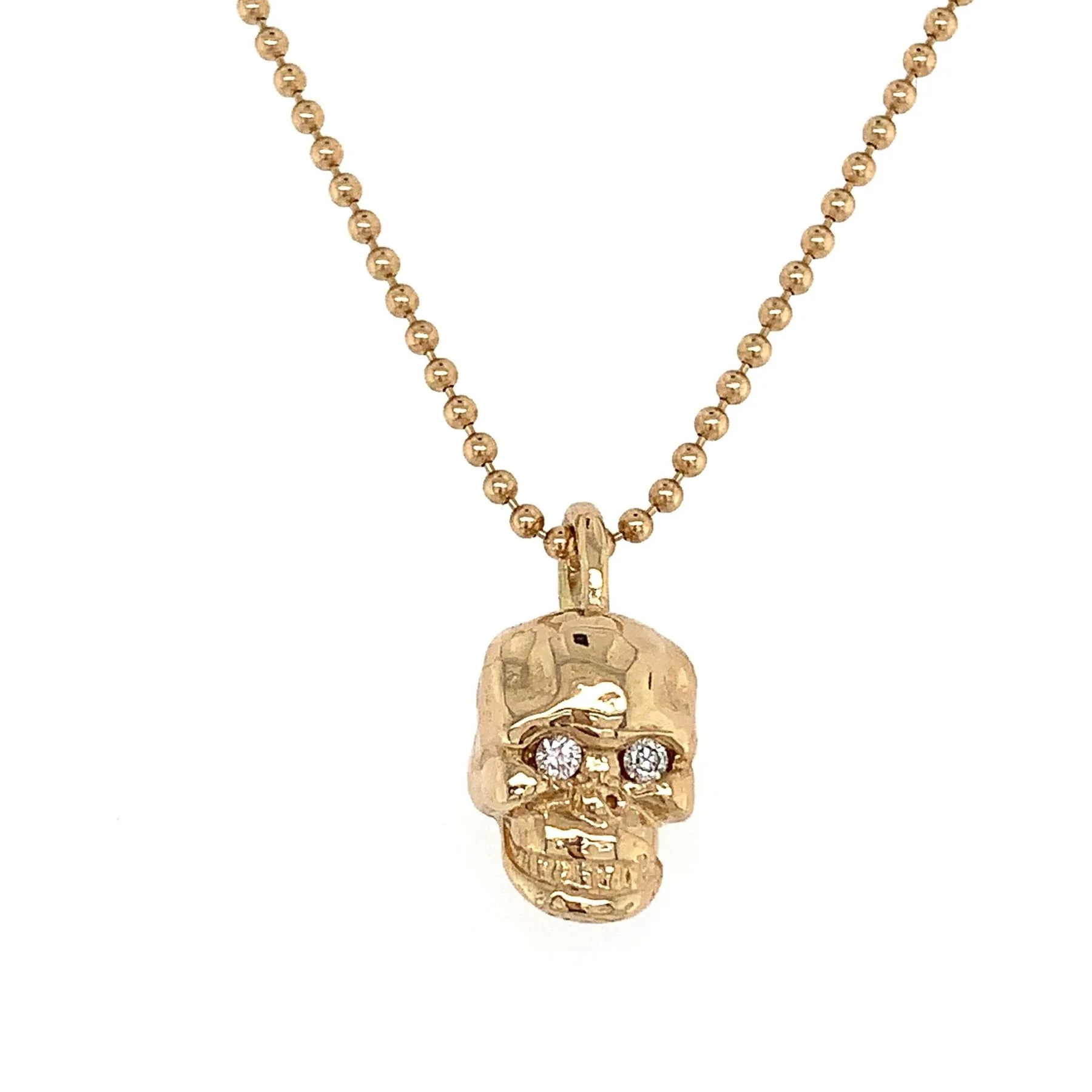 gold skull charm